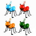 Set of 4 colorful cast iron ant garden figurines in blue, red, orange and green