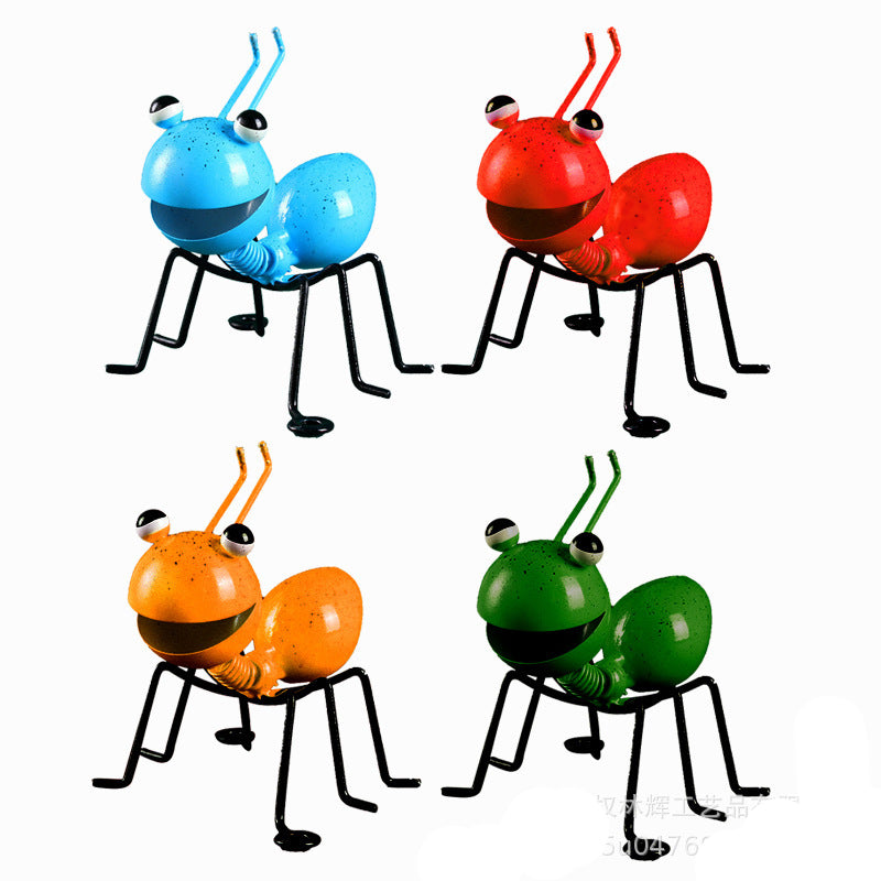 Set of 4 colorful cast iron ant garden figurines in blue, red, orange and green